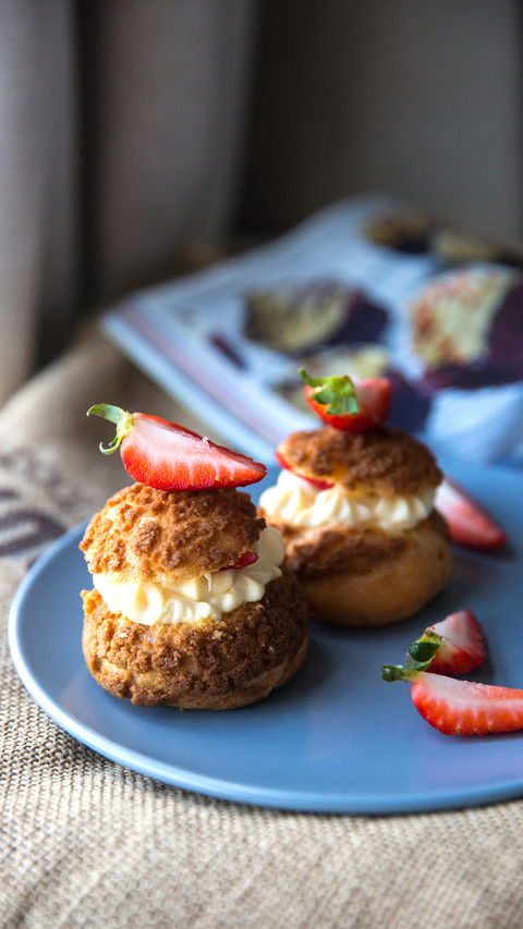 Fresh choux cream pastry or cream puff with cream preview