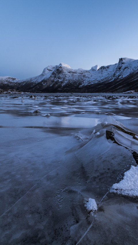 Frozen mountain lake still as a painting preview
