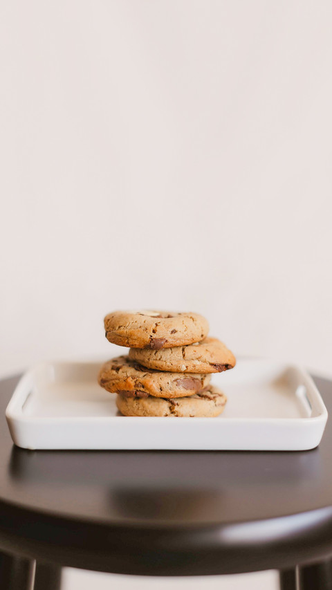 A vertical shot of freshly-baked chocolate cookies preview