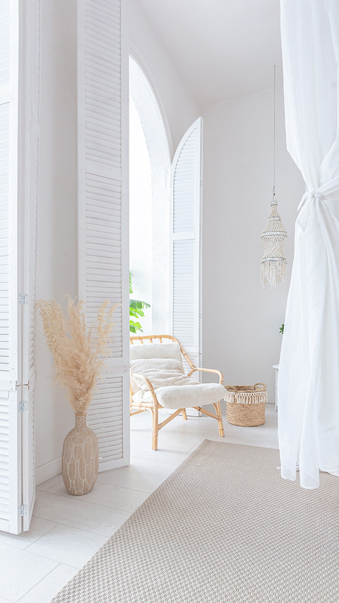 A Bright Apartment with White Walls and Bamboo Furniture preview