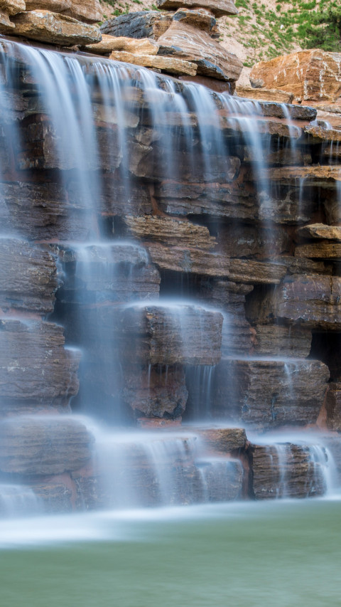The waterfall plunges into the sky and the water flows on preview