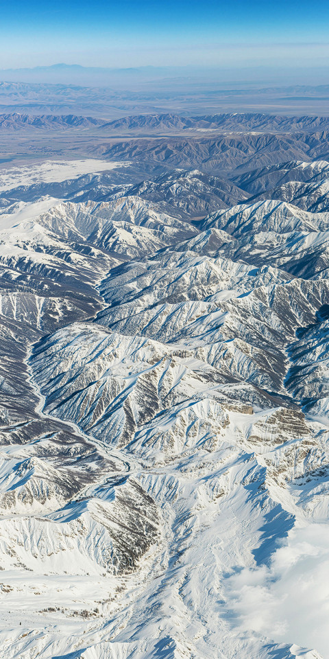 The dual faces of snowcapped mountains preview