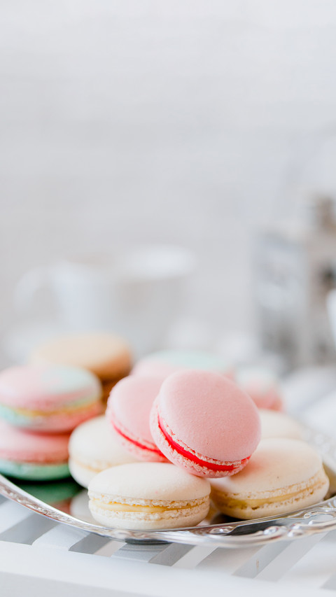 Colorful french macaroons on steel tray preview