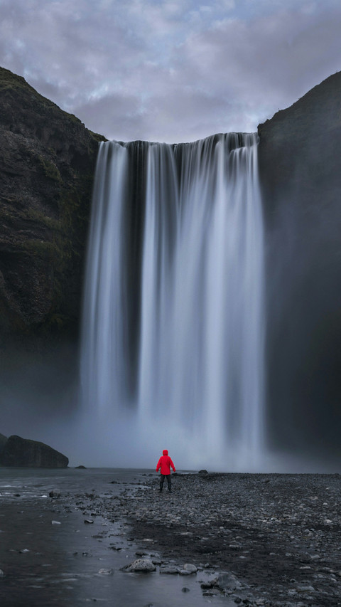 Man Standing Under The Waterfall preview