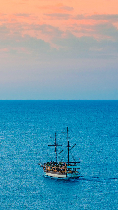 Touristic boat tour on the sea at sunrise time preview