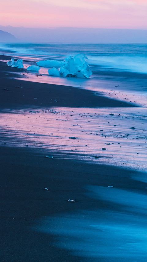 Ice lying on black volcanic beach. Iceland preview