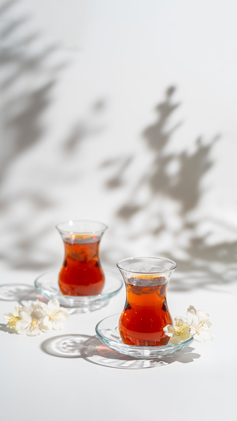 Turkish Tea in Traditional Glass Closeup on White Background preview