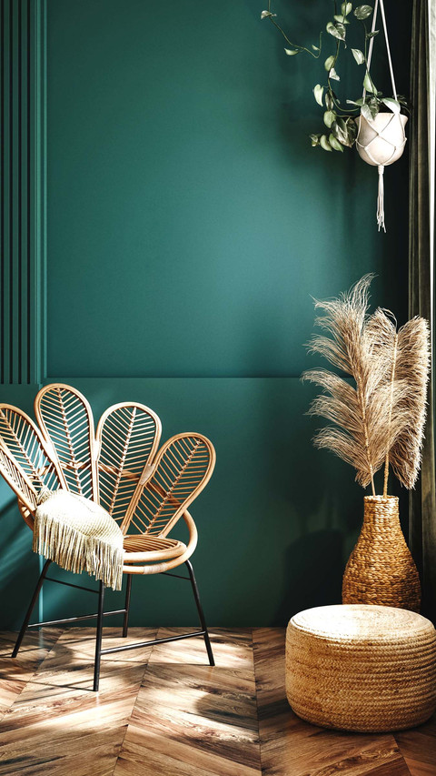 Rattan armchair, pouf and wicker decor in living room preview