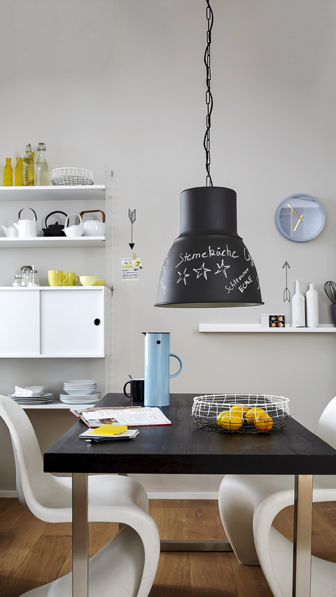 Black and white furniture and writing on chalkboard lamp preview