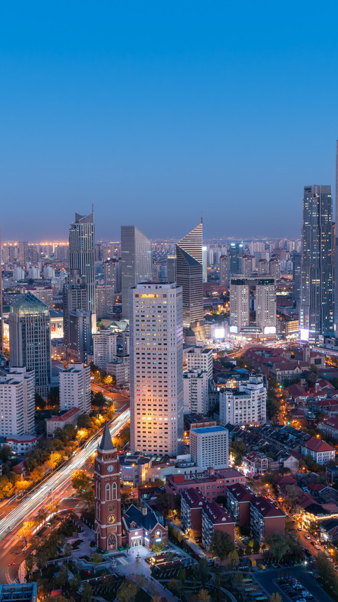 Twilight shines through the city's light and shadow. preview