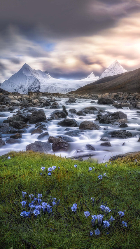 Snow capped mountains are poetry lines frozen in ice preview