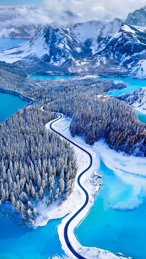 Overhead view of a road through a snow covered landscape preview