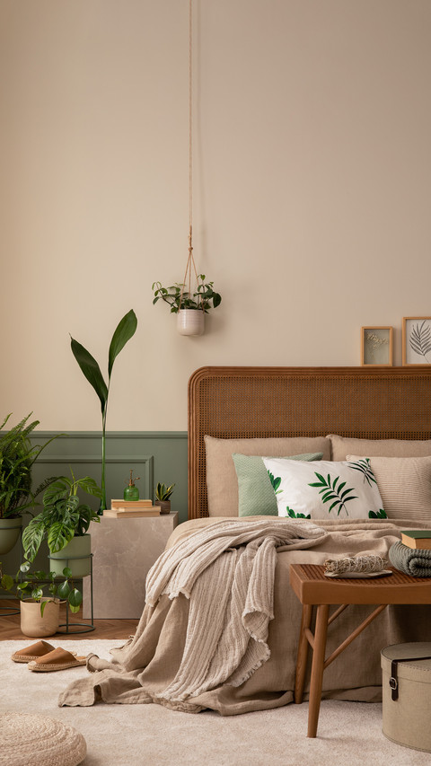 Warm and cozy bedroom interior with mock up poster frame preview