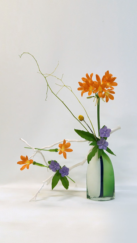 Japanese Ikebana in Colored Glass Vase preview