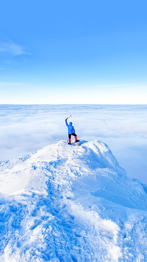 Epic scene of man at mountain top as symbol of life success preview