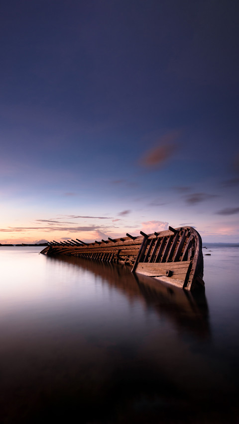 Sinking ship shot at dusk using long exposure technique preview