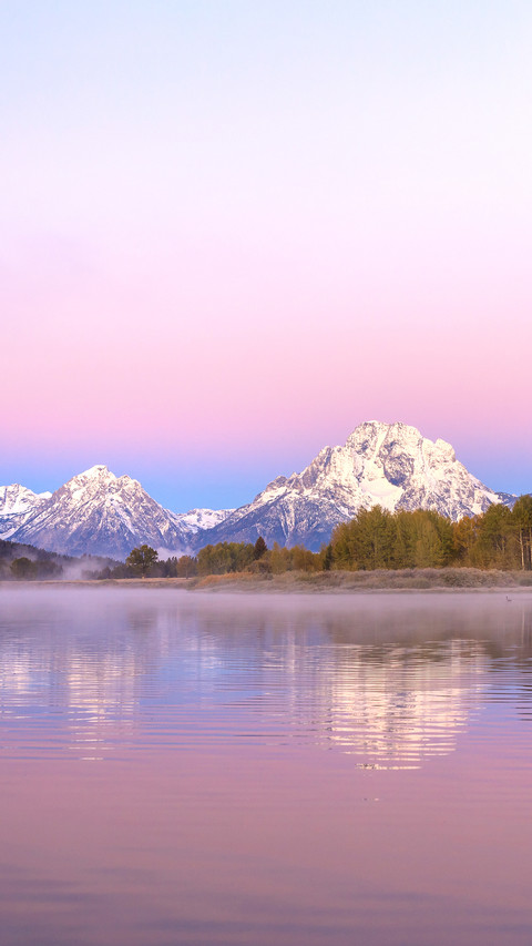 Scenic Sunrise Reflection of the Tetons in Autumn preview