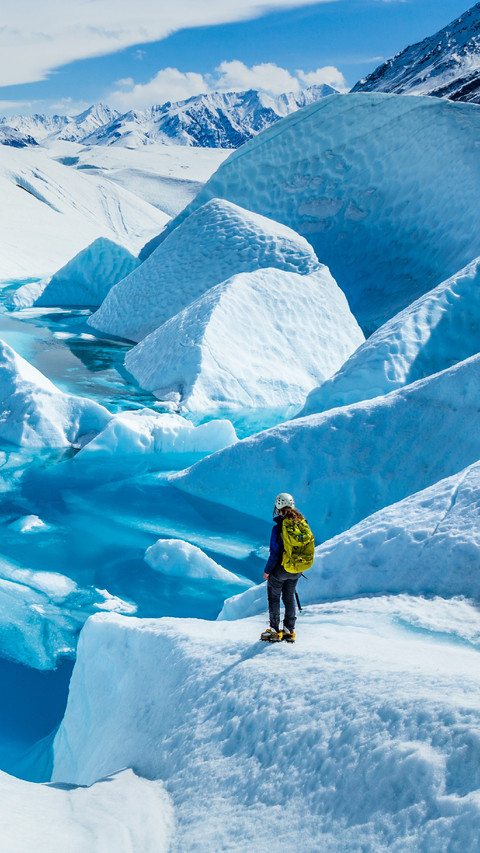 A Woman is Standing on Glacier preview