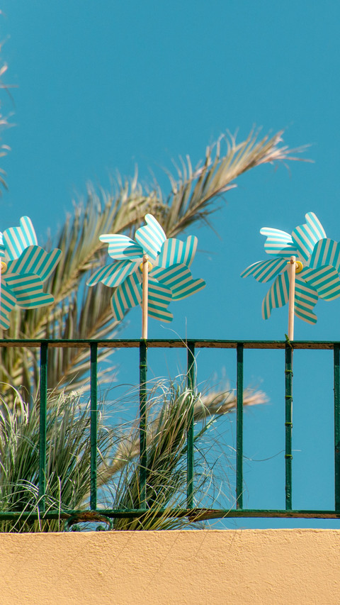 Three striped windmill toys preview