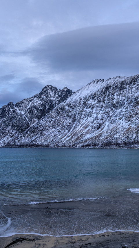 The blues of the sunrise over the snowcapped mountains preview