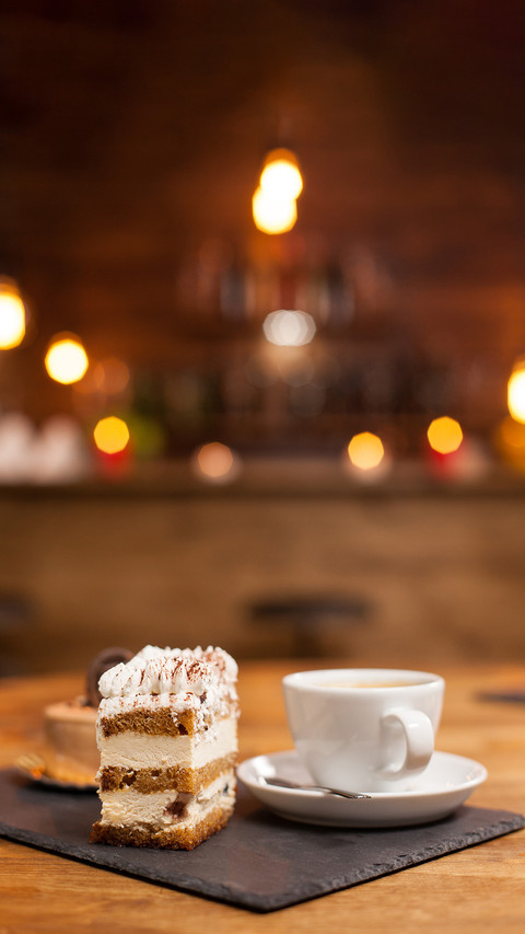 Delicious chocholate cake with white cream and cinnamon preview