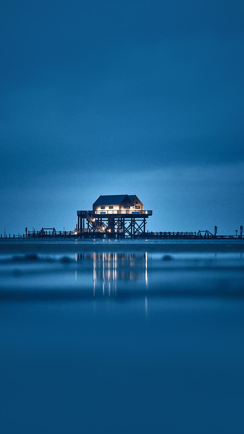 Stilt house at sankt peter-ording germany at night preview