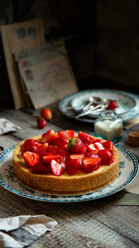 Homemade delicious strawberry tart or pieon vintage plate preview