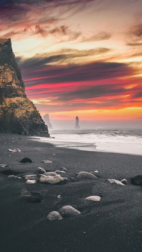 The red clouds on icelands black sand beach 2 preview