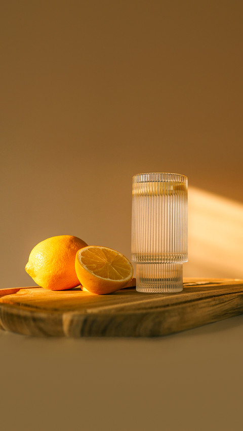 Glass of water with lemon, good morning concept preview