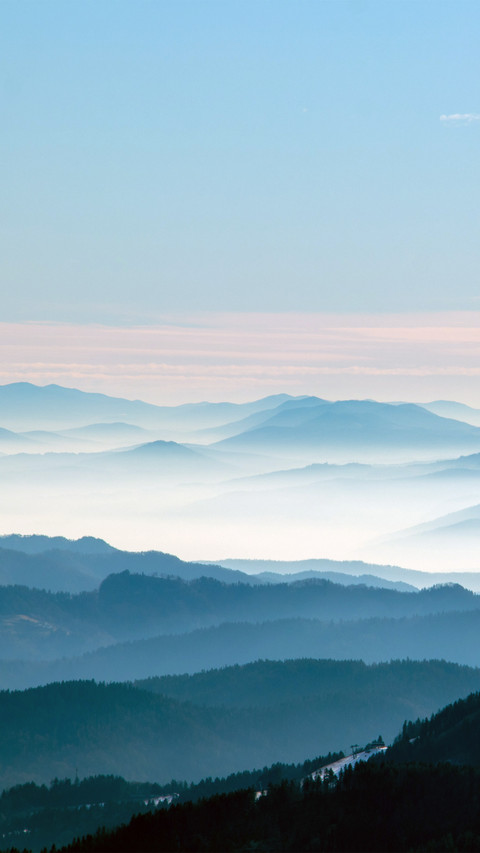 Clouds and mist surround the mountains preview