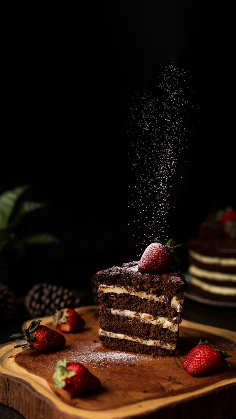 A slice of homemade chocolate cake with tasty strawberry preview