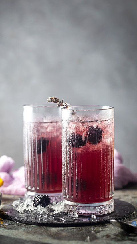 Refreshing Blackberry Lemonade in crystal glasses with ice preview
