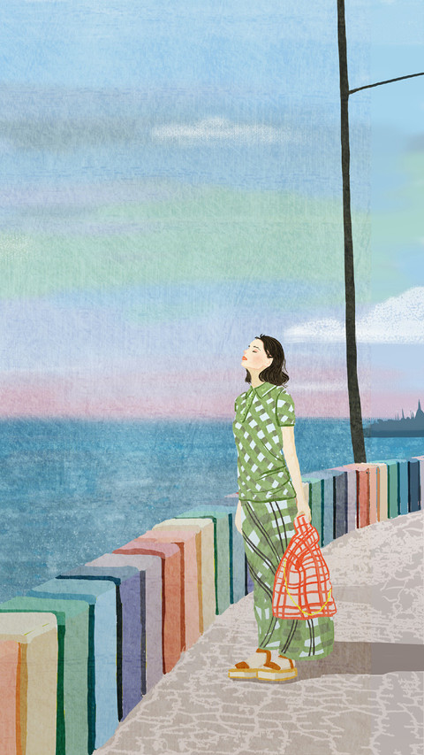 A Woman With Eyes Closed is Standing by The Sea preview