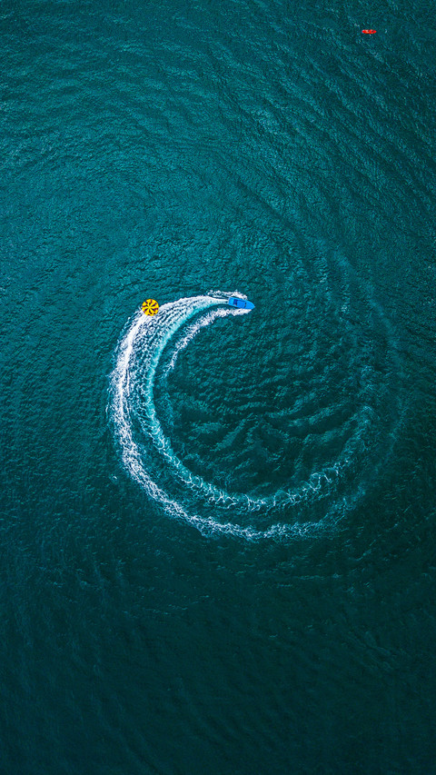 Boat makes a circle in the coastal sea of Sao Paulo preview