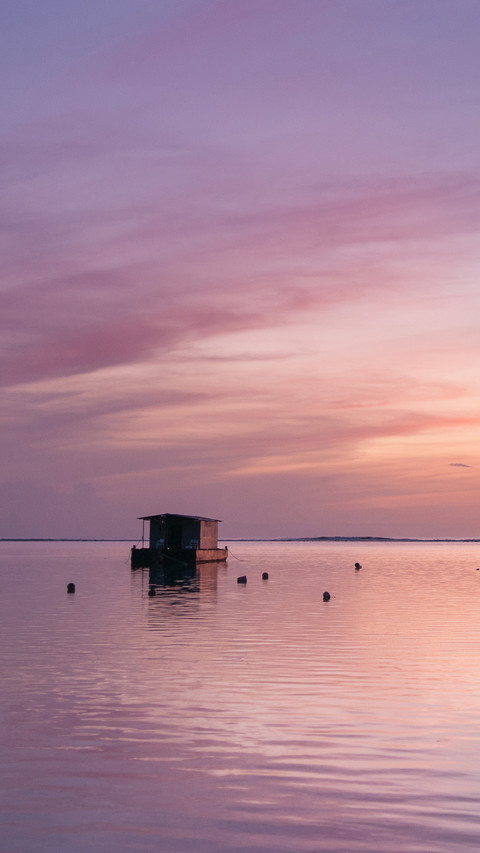 Sunset on Maldives island, water villas resort preview