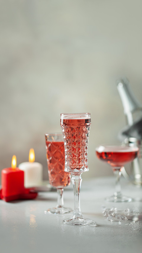 Glasses of champagne on grey background preview