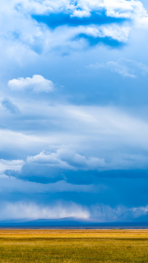 Cloudscape on grassland before heavy storm preview