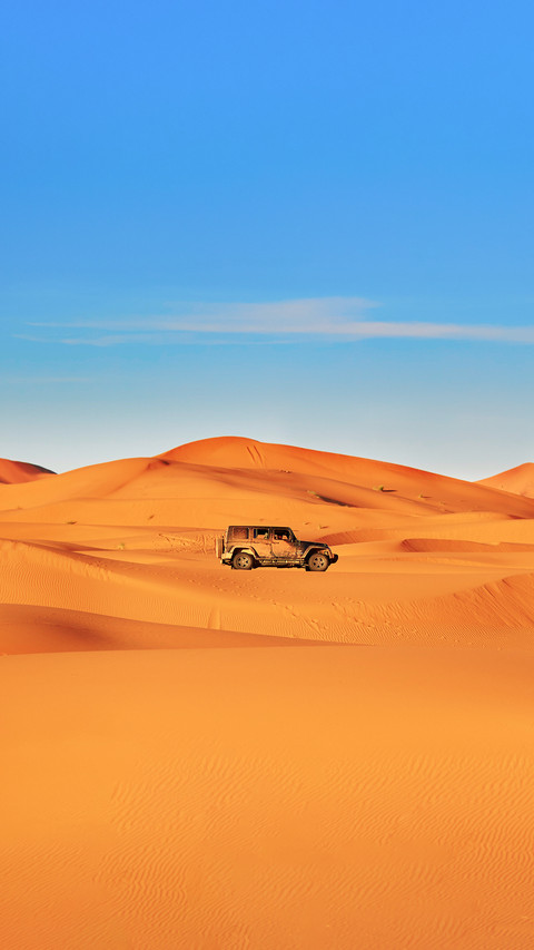 Jeep in Sand Dunes in the Sahara Desert preview
