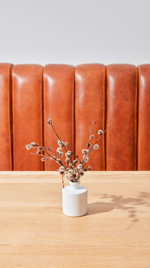 Dry flowers in a vase on a table in a room preview