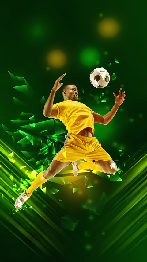 Soccer player in yellow uniform during football game preview