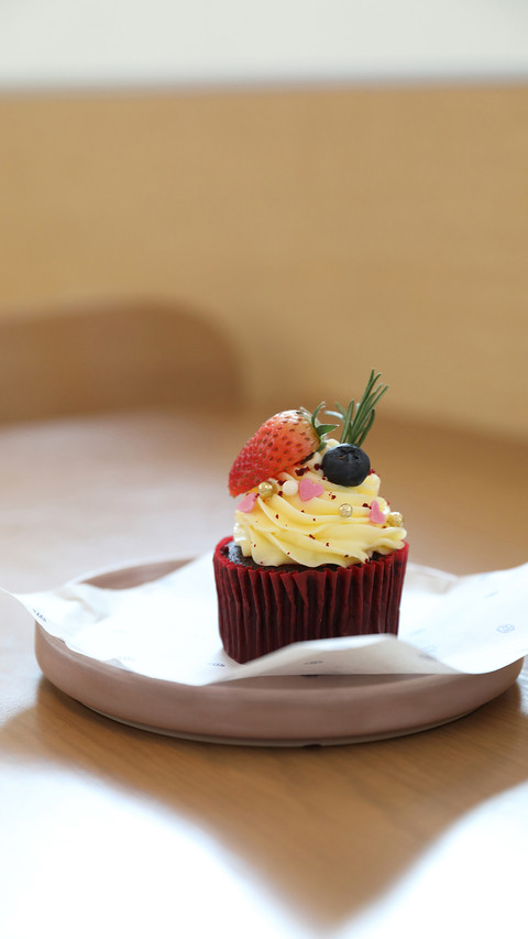 Colorful cupcakes on wood table background preview