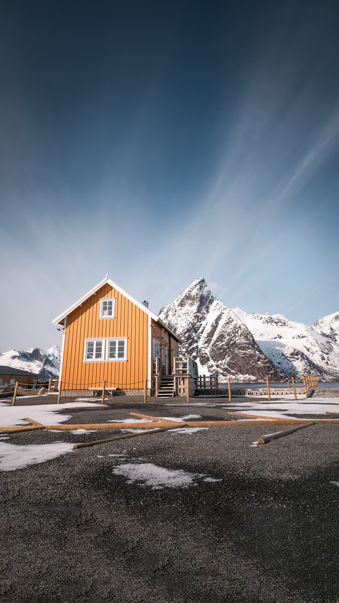 Famous yellow cabin with olstind mountain in lofoten preview