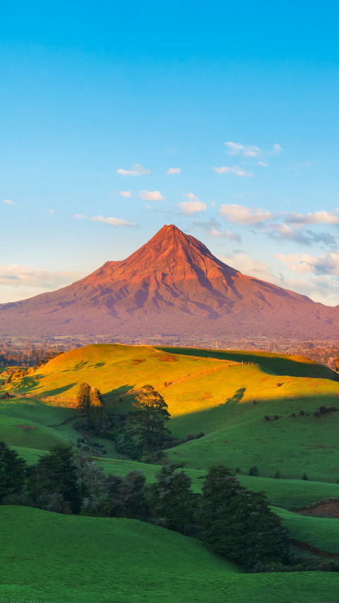 Mount Taranaki Under the Blue Sky with Grass Field preview
