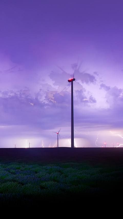 View of endless lavender field under the stormy night sky preview